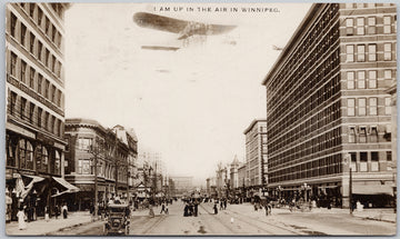 Winnipeg Manitoba Airplane 'Up In The Air' Portage Ave. RPPC Postcard 