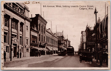 Calgary Alberta 8th Avenue West looking towards Centre Street Trolleys Molson's Bank Postcard 