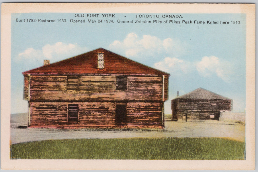 Vintage postcard of Old Fort York in Toronto, Canada with a wooden building and grassy area.