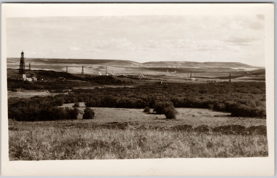 Oil Derricks Turner Valley area Alberta Lane High River RPPC Postcard 