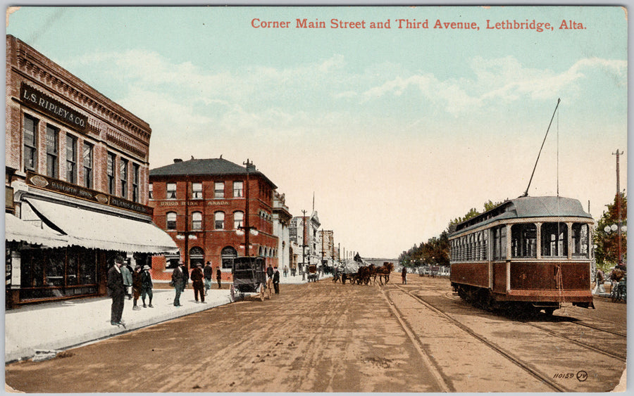 Lethbridge Alberta Main Street and 3rd Ave Trolley Streetcar Union Bank of Canada Unused Postcard