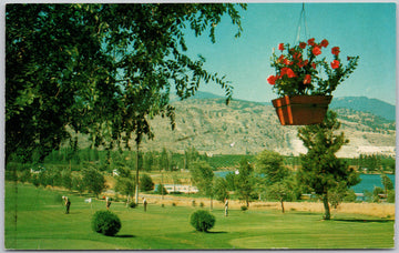 Oliver BC Cherry Grove Golf Country Club Golfers Golfing Tuc-el-nuit Lake Hanging Flower Basket Postcard