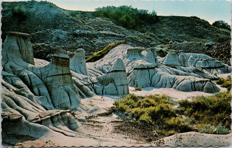 Drumheller Hoodoos Drumheller Alberta Badlands Postcard SP8 *as is